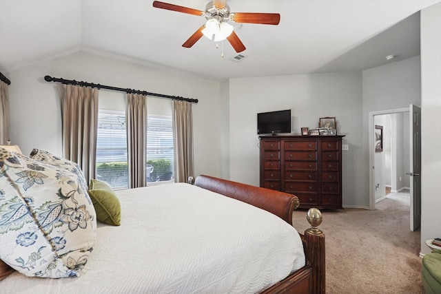 carpeted bedroom with lofted ceiling and ceiling fan