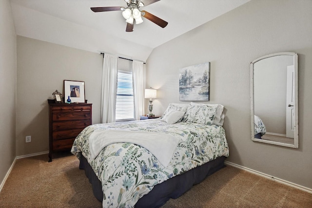 bedroom featuring lofted ceiling, ceiling fan, and carpet floors