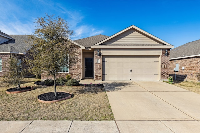 view of front of house with a front lawn and a garage