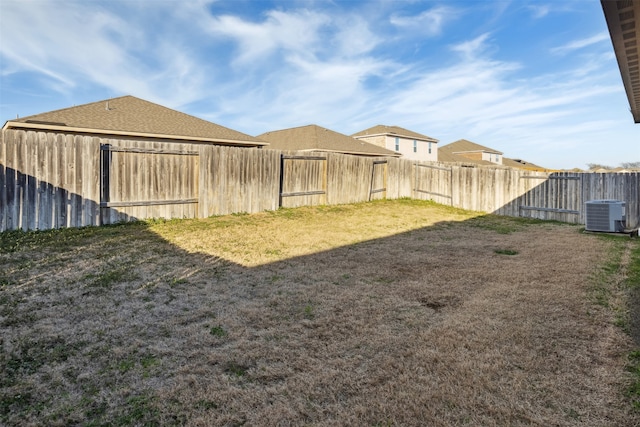 view of yard featuring central AC unit