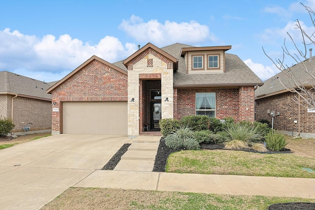 view of front of property with driveway, roof with shingles, a garage, stone siding, and brick siding