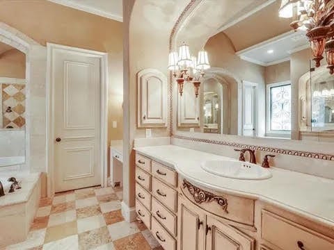 full bath featuring crown molding, vanity, and tile patterned floors