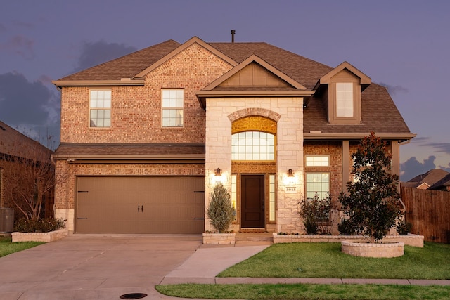 view of front of home with a garage