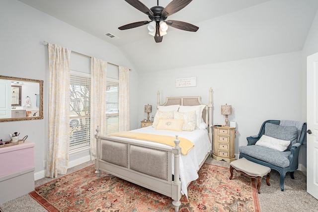 carpeted bedroom featuring vaulted ceiling and ceiling fan