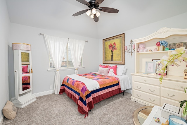 carpeted bedroom featuring lofted ceiling and ceiling fan