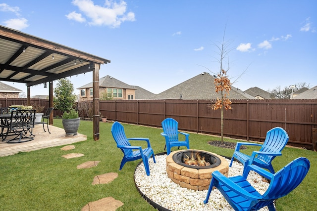 view of yard featuring a patio area and a fire pit