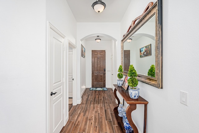 corridor featuring hardwood / wood-style floors