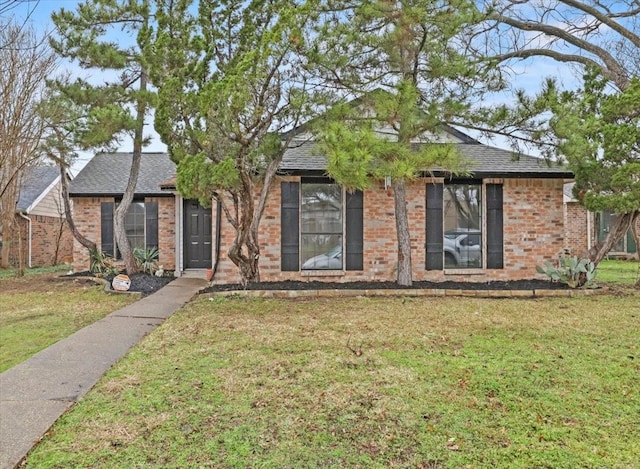 view of front of home with a front yard