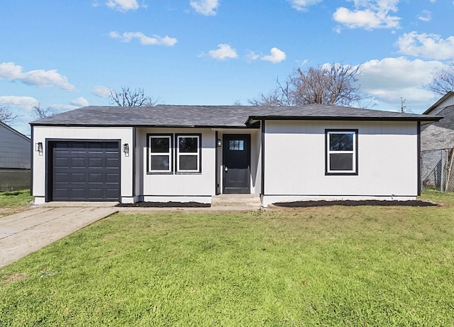 single story home with a front lawn and a garage