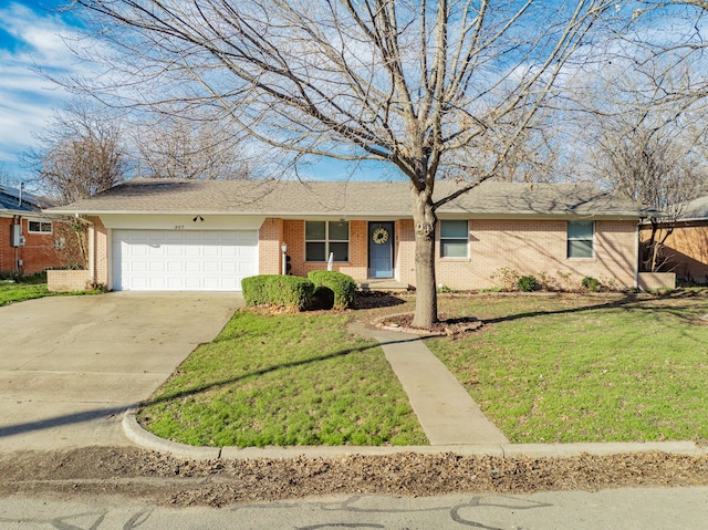 ranch-style house featuring concrete driveway, a front lawn, brick siding, and a garage