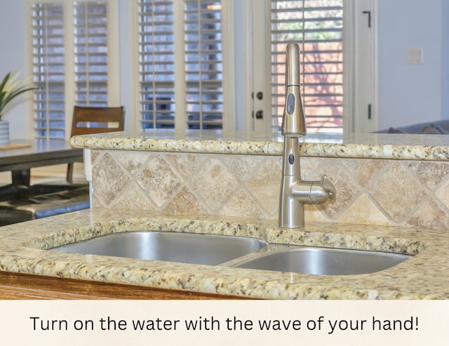 details with sink and decorative backsplash