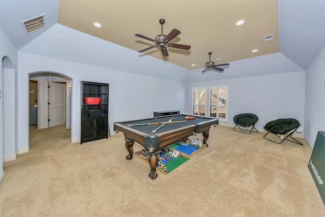 rec room with light carpet, vaulted ceiling, pool table, and a raised ceiling