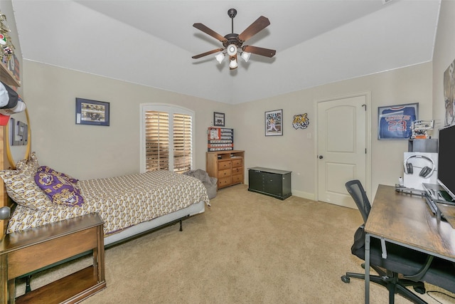 carpeted bedroom featuring ceiling fan and lofted ceiling