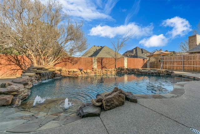 view of swimming pool featuring pool water feature