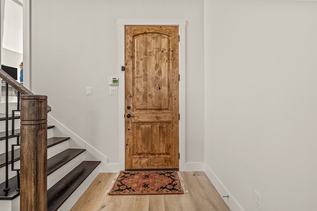 foyer with hardwood / wood-style floors