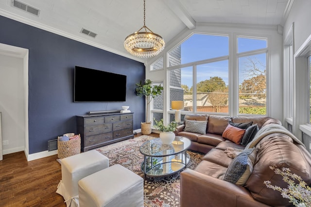 living room featuring dark hardwood / wood-style floors, crown molding, an inviting chandelier, and lofted ceiling with beams