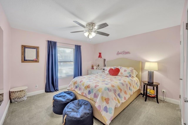 bedroom with light colored carpet and ceiling fan