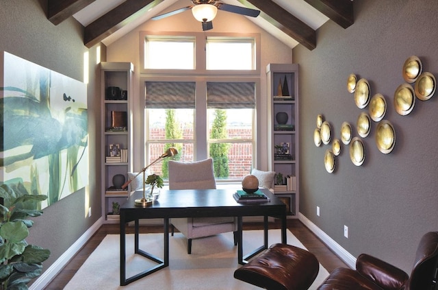 office space featuring hardwood / wood-style floors, vaulted ceiling with beams, and ceiling fan