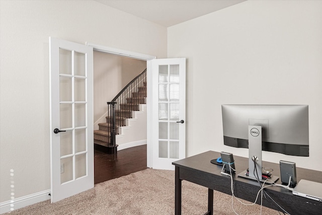 home office with french doors and carpet flooring