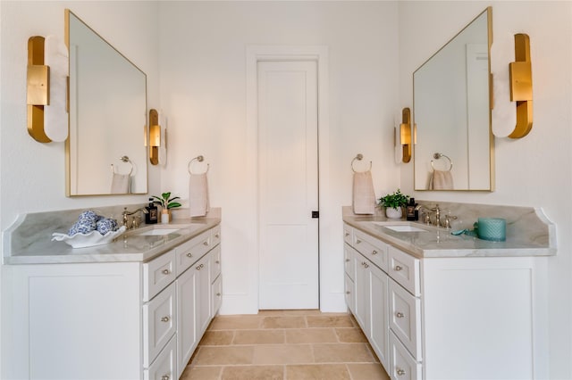 bathroom with two vanities and a sink