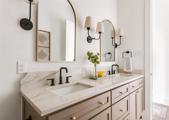 bathroom with double vanity and a sink