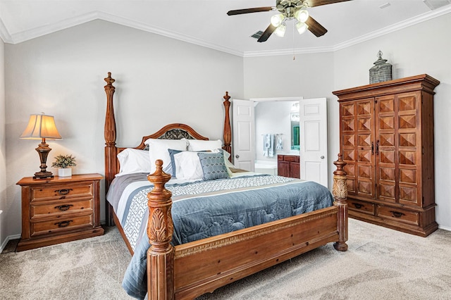 carpeted bedroom featuring ensuite bathroom, crown molding, and ceiling fan