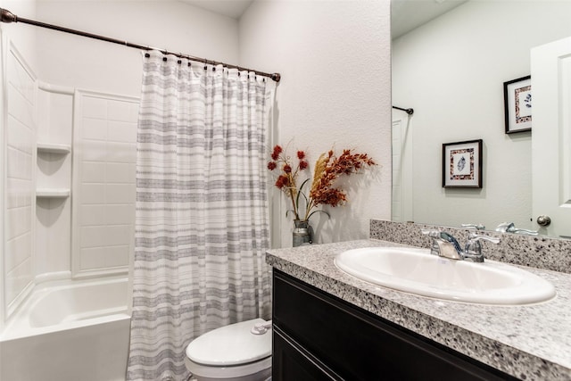 full bathroom with shower / tub combo with curtain, vanity, and toilet