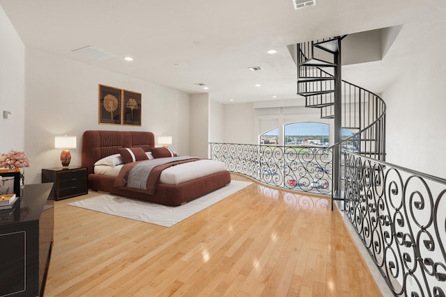 bedroom featuring light hardwood / wood-style flooring