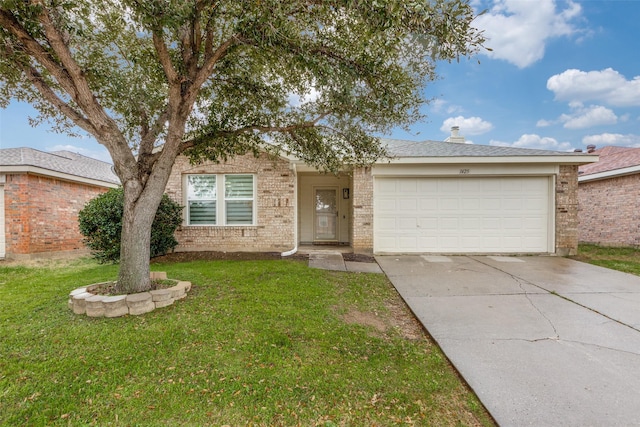 ranch-style home with a front lawn, brick siding, driveway, and an attached garage