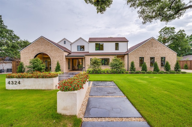 view of front of home with a front yard