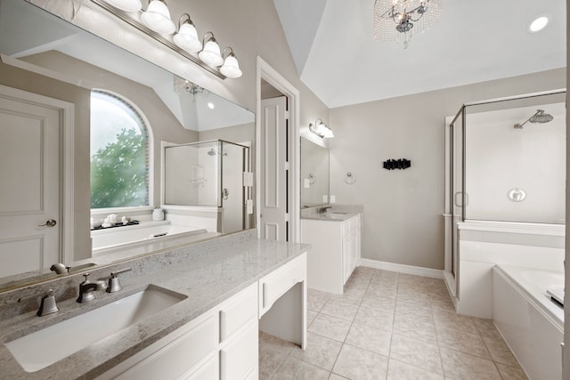 full bath with tile patterned flooring, a garden tub, a sink, vaulted ceiling, and a stall shower