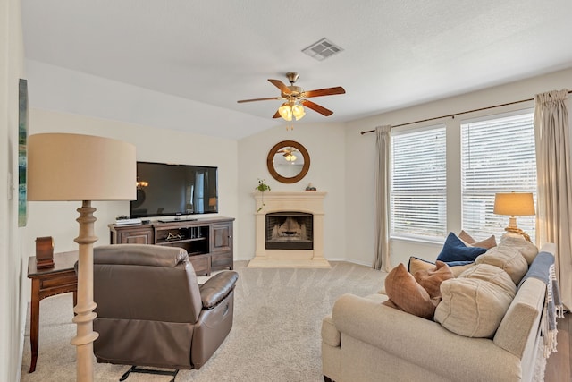 living room featuring ceiling fan and light colored carpet