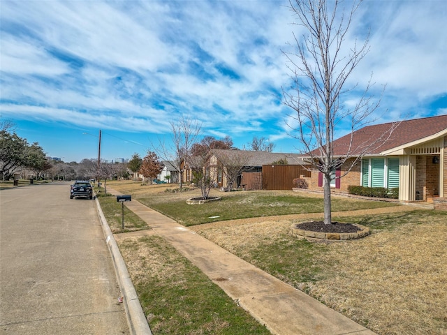 exterior space with curbs and sidewalks