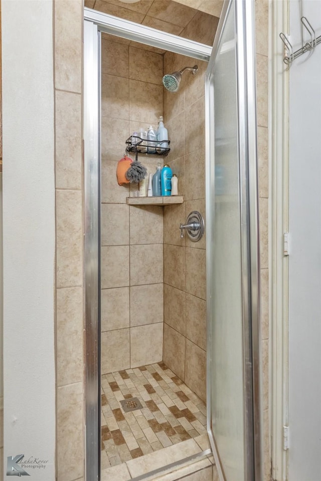 bathroom with an enclosed shower