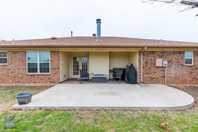 rear view of house featuring a patio area