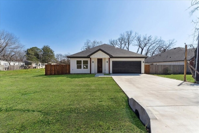 ranch-style home with a front yard and a garage