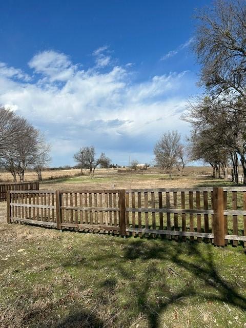 exterior space with a rural view