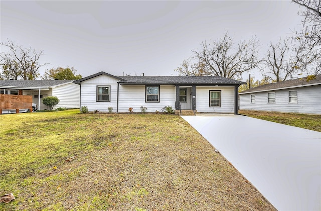 ranch-style home with a front yard