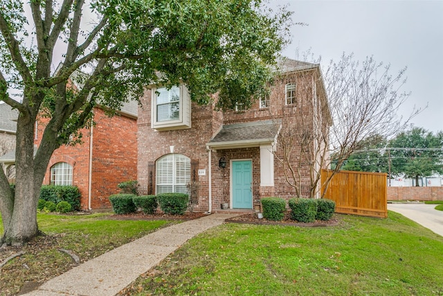 view of front of home featuring a front yard