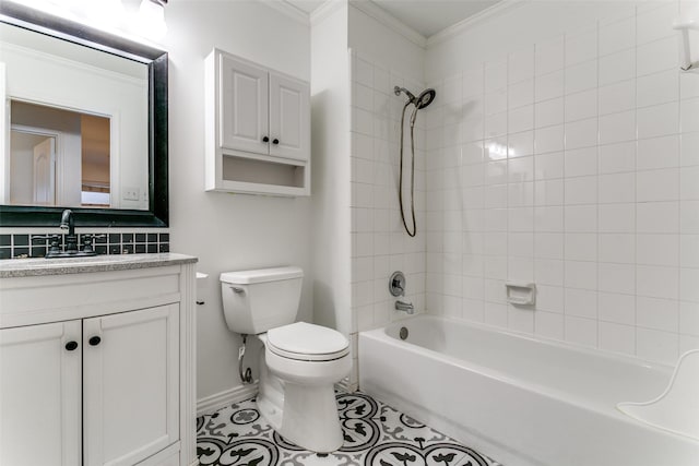 full bathroom featuring tile patterned floors, ornamental molding, toilet, vanity, and tiled shower / bath combo