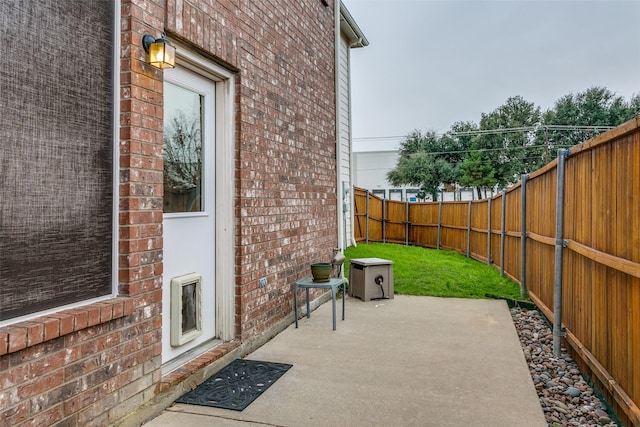 view of patio / terrace featuring heating unit