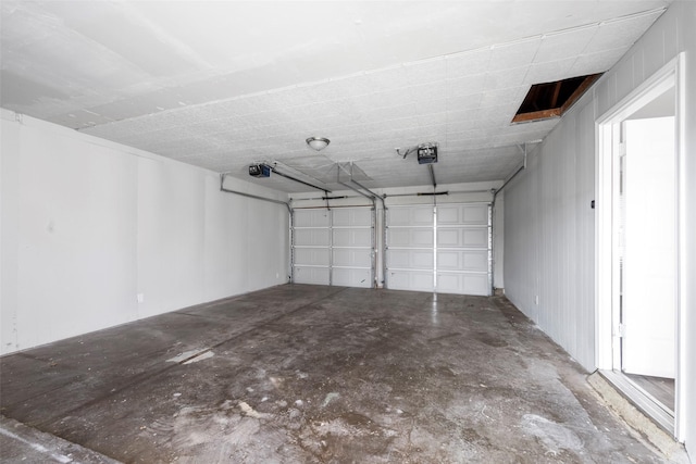 garage featuring a garage door opener