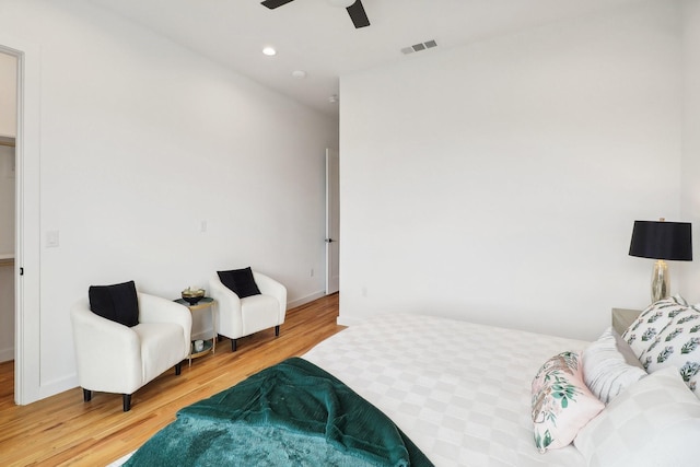 bedroom featuring a ceiling fan, recessed lighting, visible vents, and light wood-style flooring