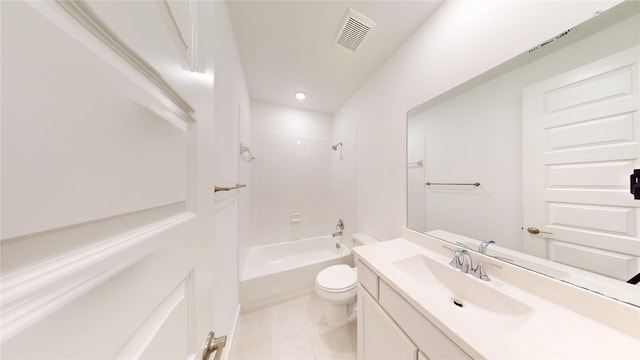 full bathroom with tiled shower / bath combo, vanity, toilet, and tile patterned floors