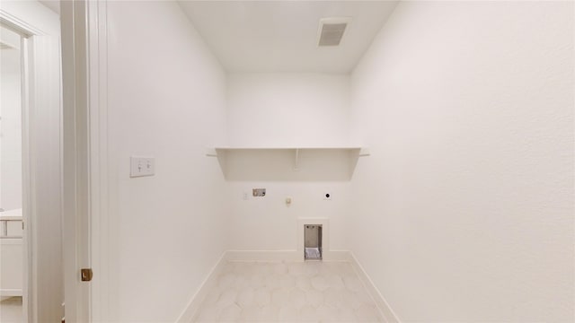 clothes washing area featuring hookup for a gas dryer, hookup for an electric dryer, and hookup for a washing machine