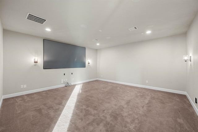 unfurnished room with visible vents, recessed lighting, baseboards, and carpet floors