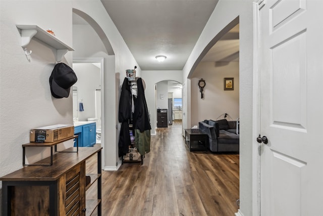 entryway with dark hardwood / wood-style floors