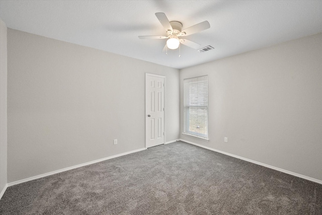 carpeted empty room with ceiling fan