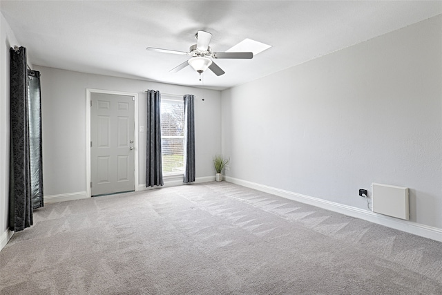 2529 Guerrero Dr, Carrollton, TX 75006 - empty room featuring light carpet, a ceiling fan, and baseboards