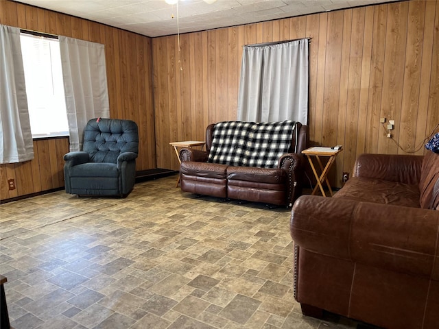 living room featuring wood walls